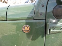 J8 badge